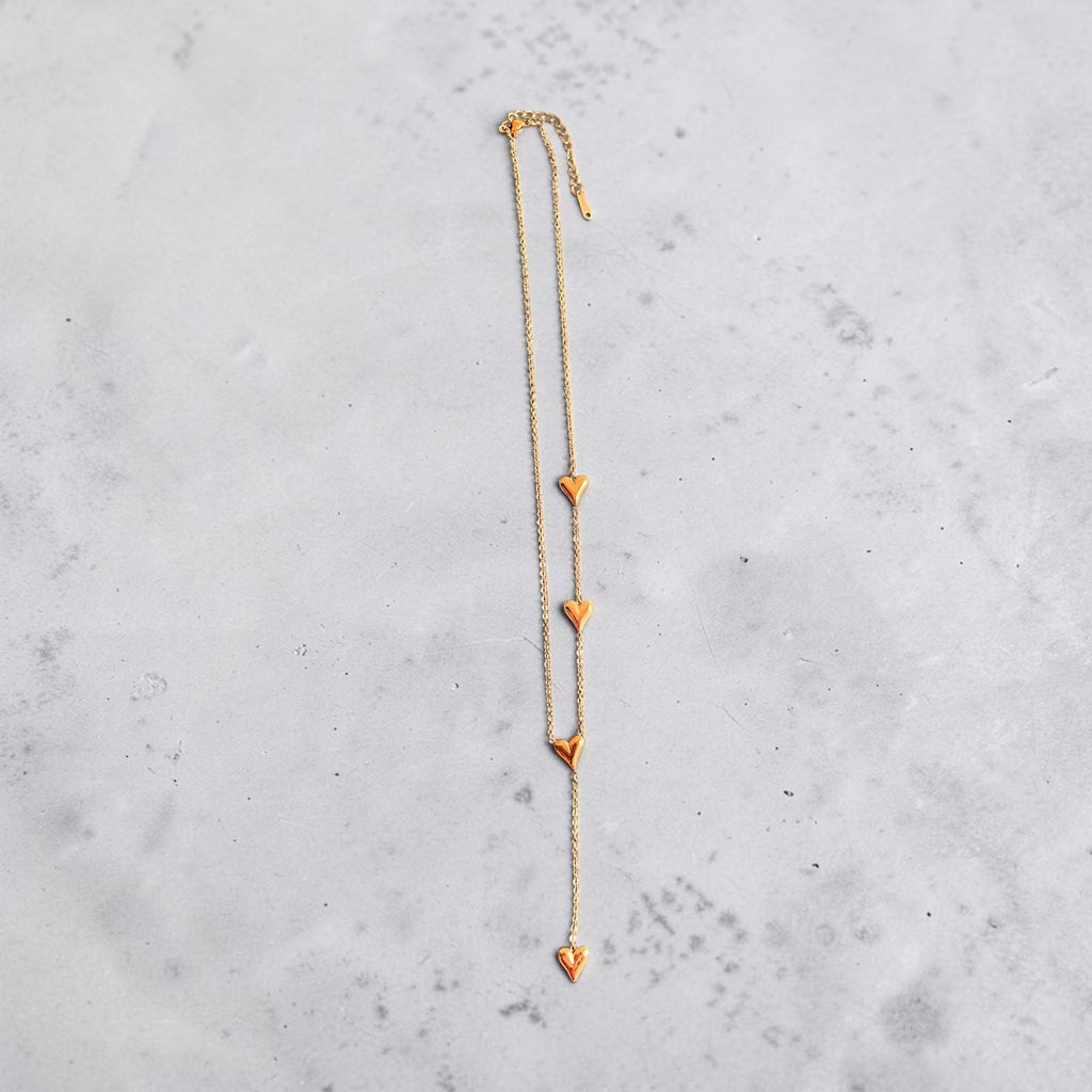 Golden Hearts Lariat Necklace - House of Alanki